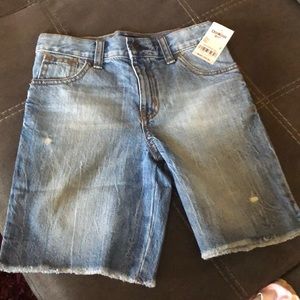 Light blue cut off jean shorts.